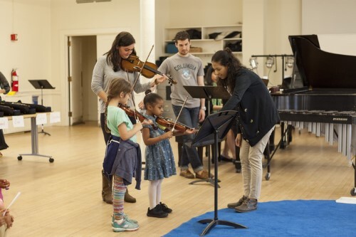 music educator engaging young students with music education